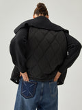 Wintermantel mit Patchwork-Kragen und geometrischem Muster